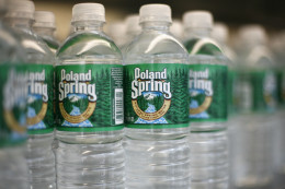 UNITED STATES - JULY 18:  Bottles of Poland Spring water, are arranged on a shelf in New York on Tuesday, July 18, 2006. Poland Spring, bottled at multiple sources in the state of Maine is Nestle's biggest and the No. 1 bottled water brand in the U.S. with sales of at least 500 million Swiss francs ($411) in 2004.  (Photo by Tom Starkweather/Bloomberg via Getty Images)